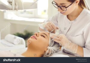 stock-photo-beautiful-lady-getting-corrective-dermal-aesthetic-improvement-treatment-and-receiving-safe-2140129477